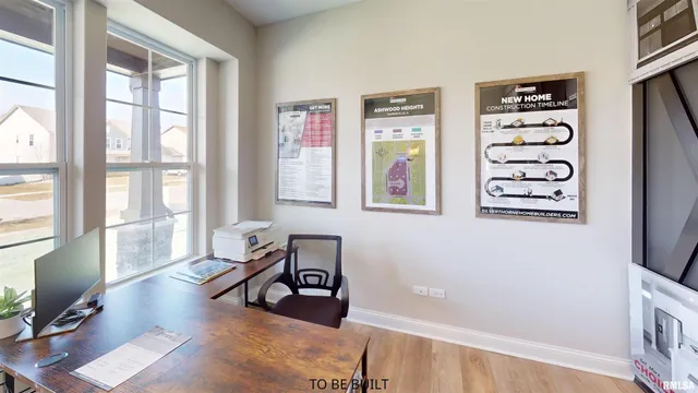 a living room with furniture a flat screen tv and a window