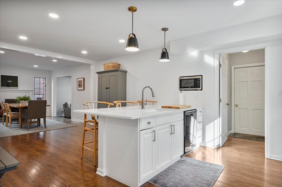 989 Ash Street Winnetka, IL 60093 - Photo 12 of 35 a view of living room with granite countertop furniture and fireplace