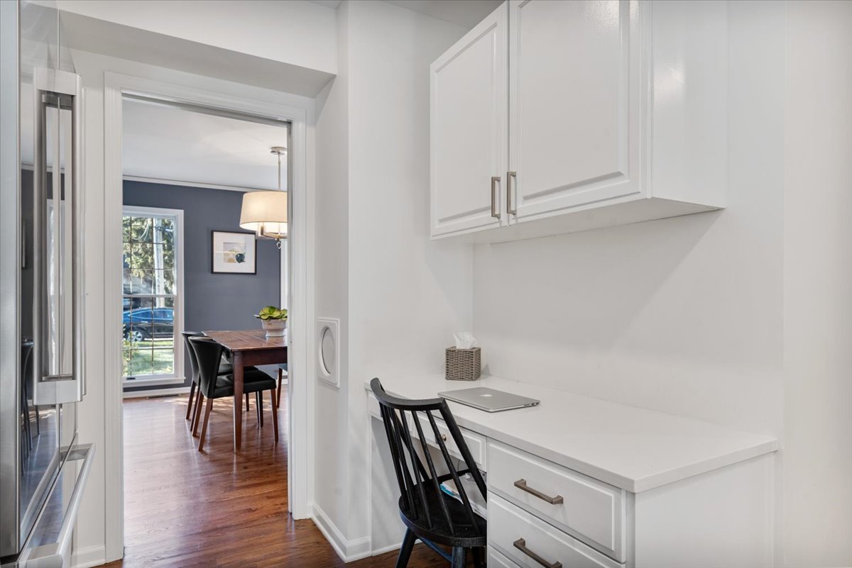 989 Ash Street Winnetka, IL 60093 - Photo 13 of 35 a view of a dining room with furniture and wooden floor