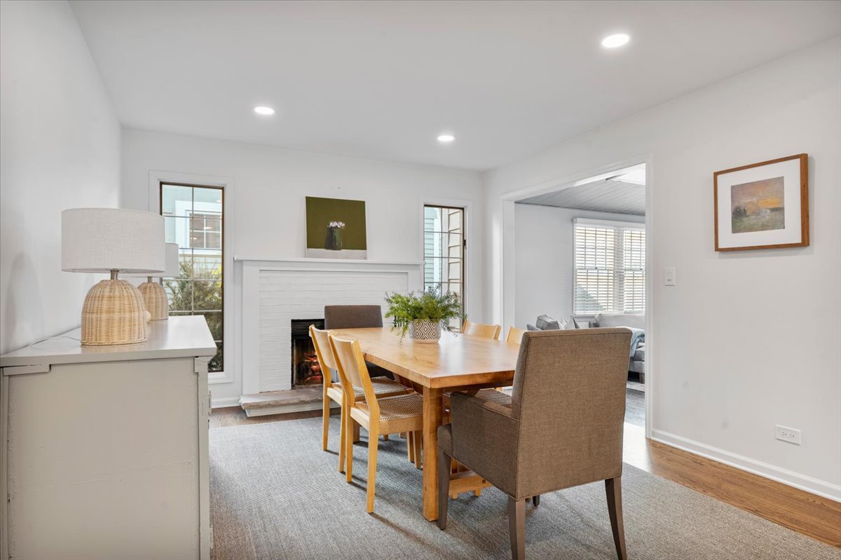 989 Ash Street Winnetka, IL 60093 - Photo 16 of 35 a view of a dining room with furniture and wooden floor