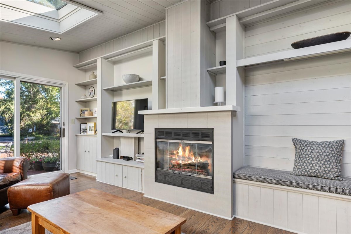 989 Ash Street Winnetka, IL 60093 - Photo 18 of 35 a living room with furniture and a fireplace