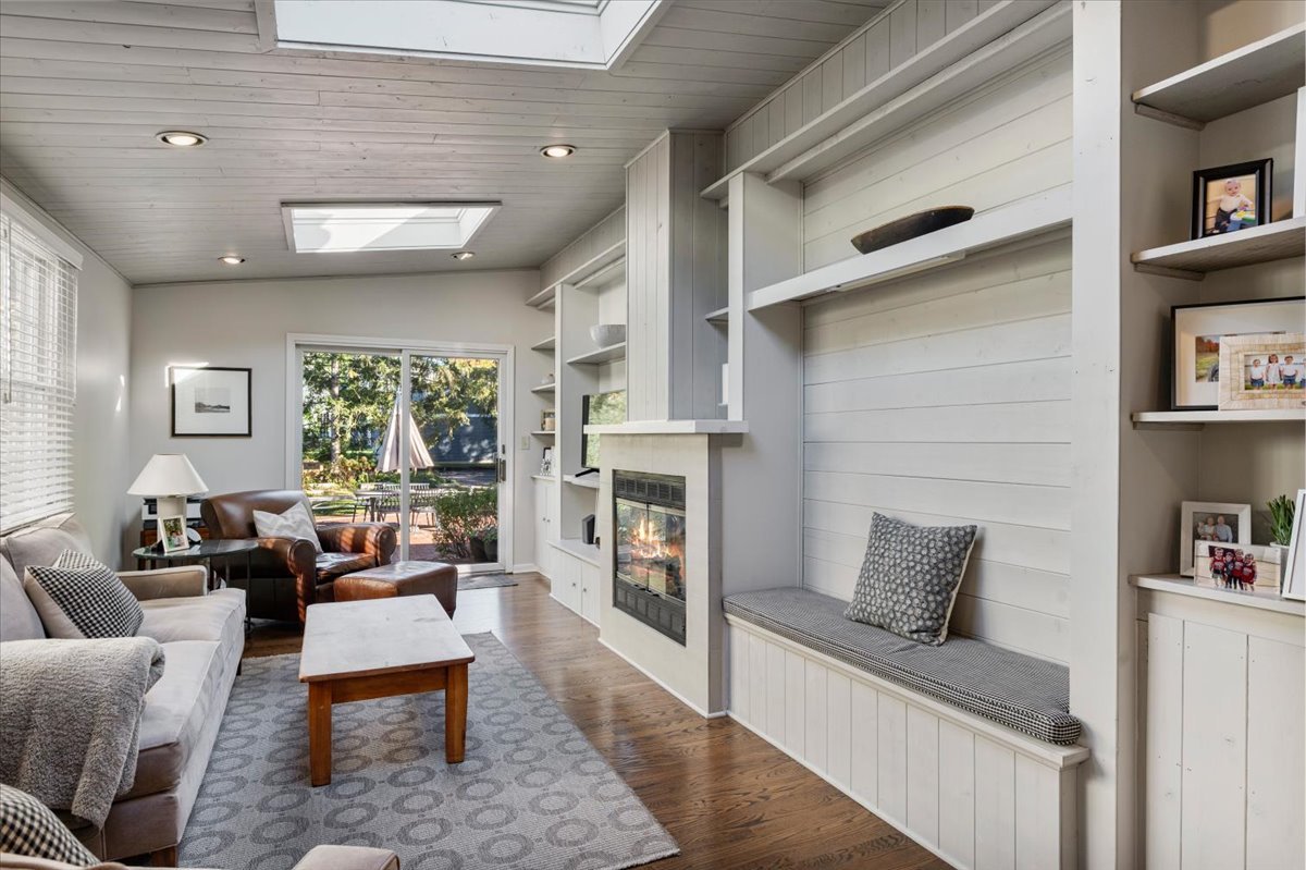 989 Ash Street Winnetka, IL 60093 - Photo 19 of 35 a living room with furniture and a fireplace