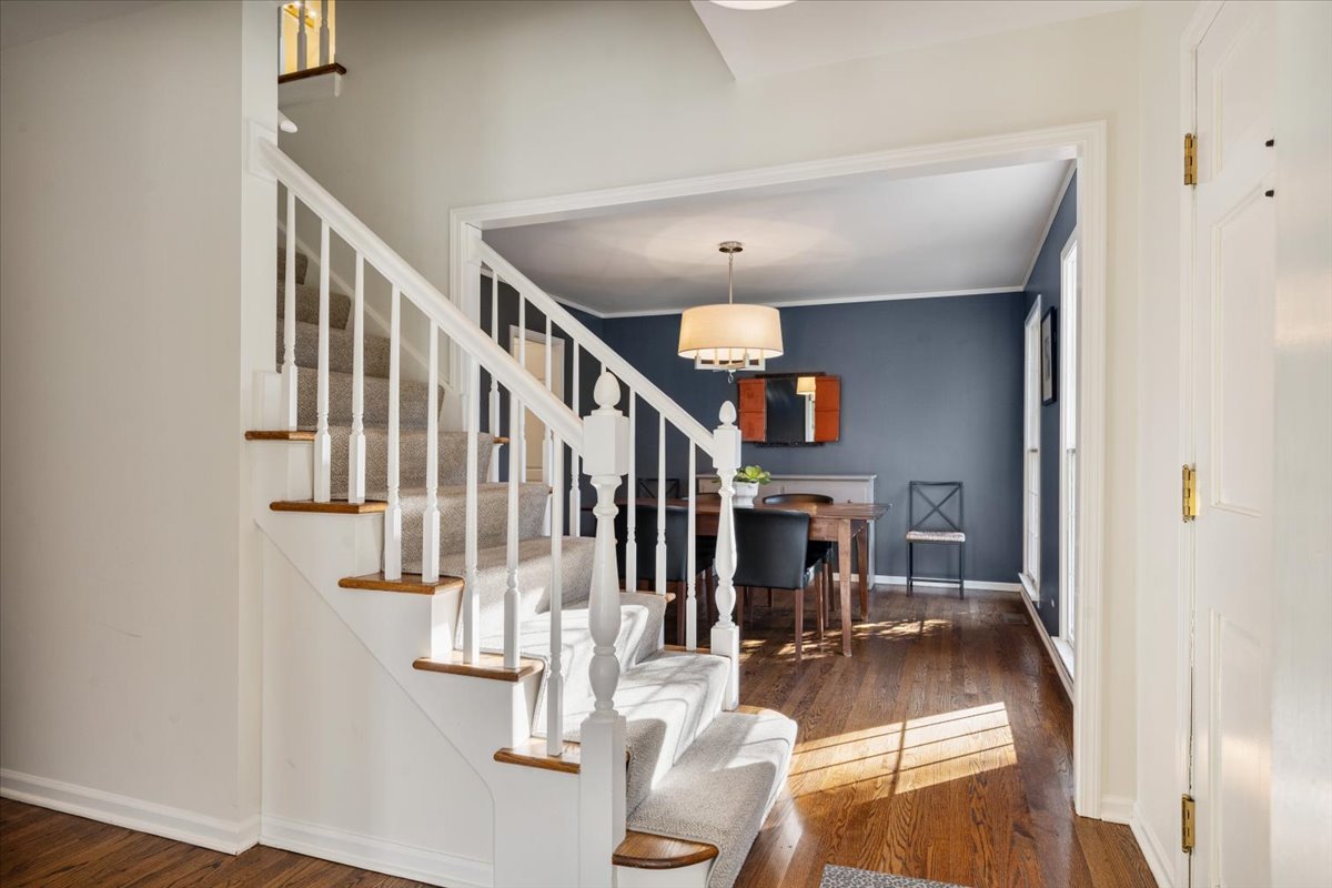 989 Ash Street Winnetka, IL 60093 - Photo 7 of 35 a view of entryway and hall with wooden floor