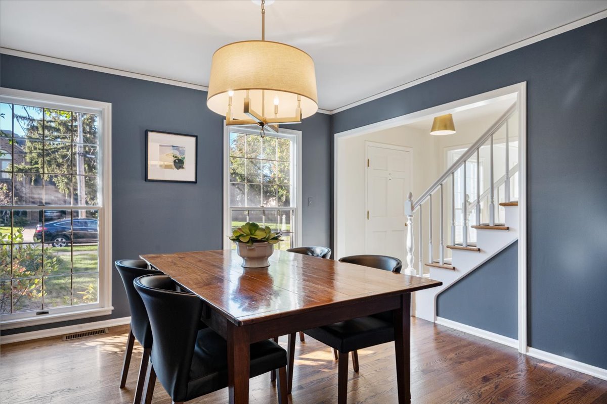 989 Ash Street Winnetka, IL 60093 - Photo 8 of 35 a view of a dining room with furniture window and wooden floor