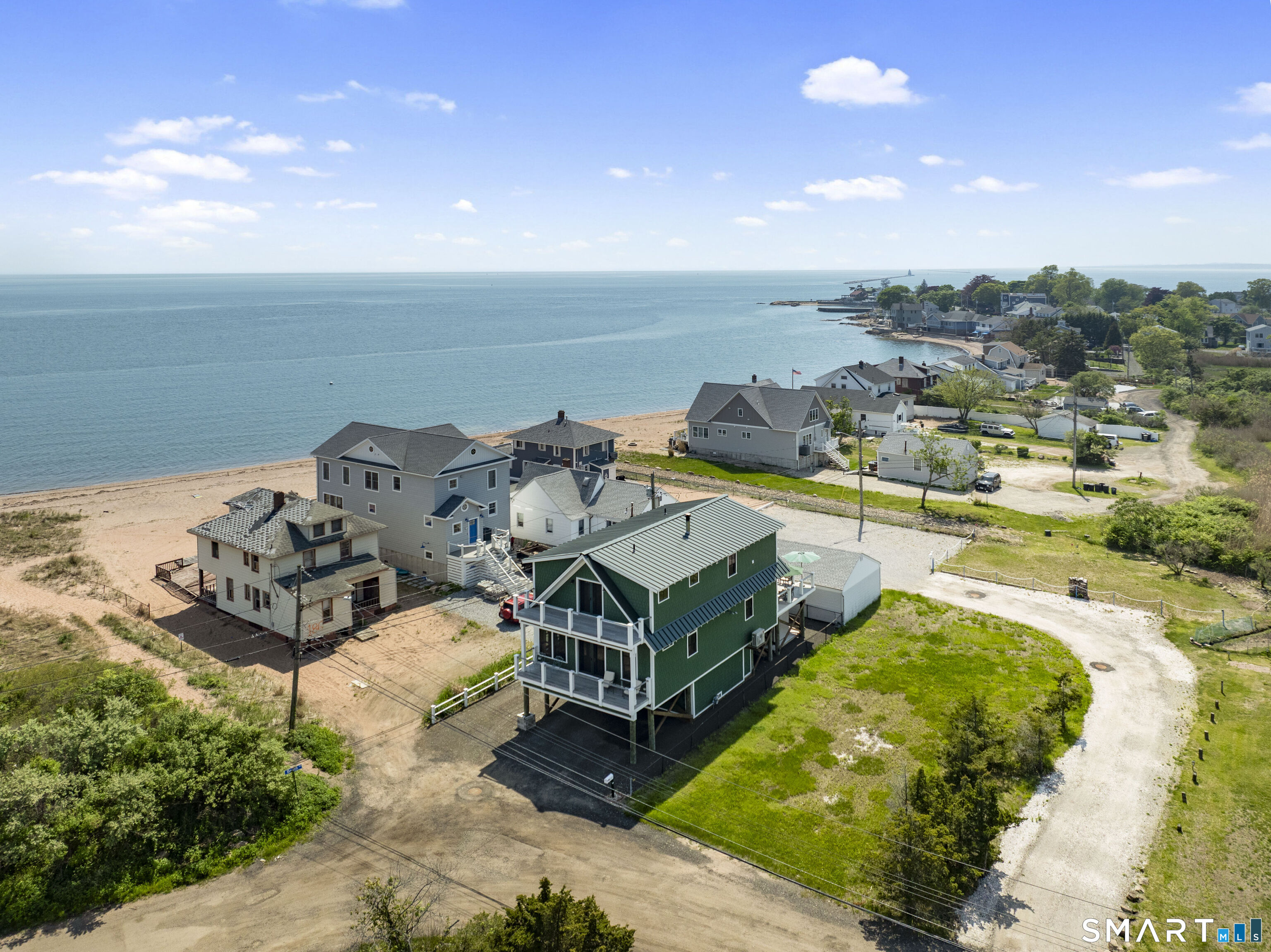 2 Minor Road East Haven, CT 06512 - Photo 1 of 36 an aerial view of a house with outdoor space swimming pool and ocean view