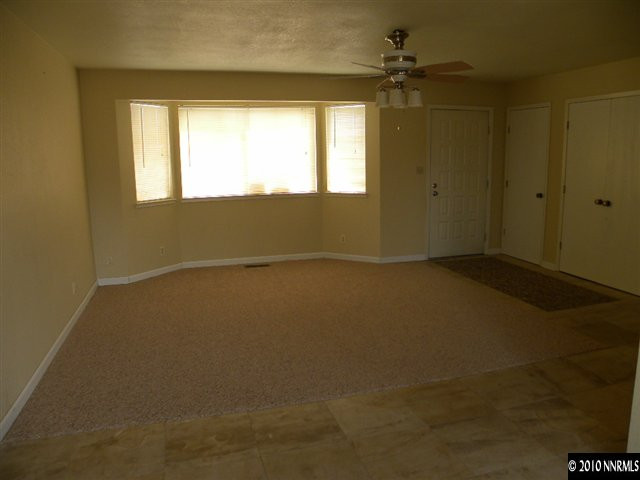 3835 Peregrine Circle Reno, NV 89508 - Photo 2 of 9 an empty room with a window