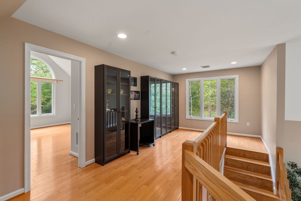 11 Black Elk Road Sharon, MA 02067 - Photo 16 of 28 a view of a living room with furniture and windows