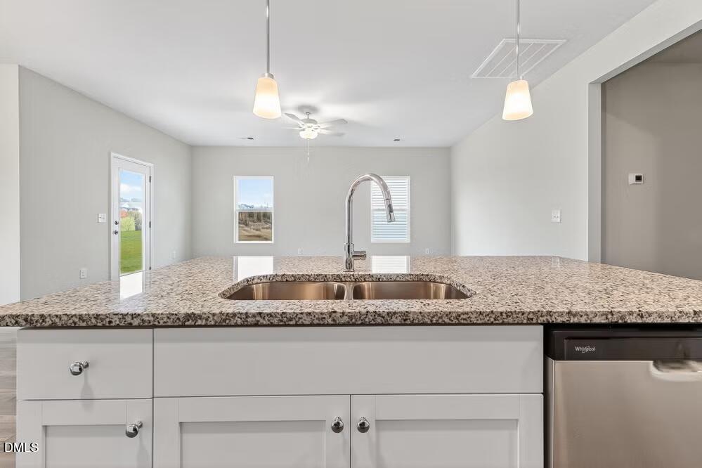 460 Hallingsfield Way Zebulon, NC 27597 - Photo 10 of 31 a bathroom with a granite countertop double vanity and a mirror