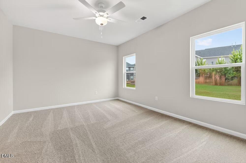 460 Hallingsfield Way Zebulon, NC 27597 - Photo 23 of 31 a view of an empty room with a window