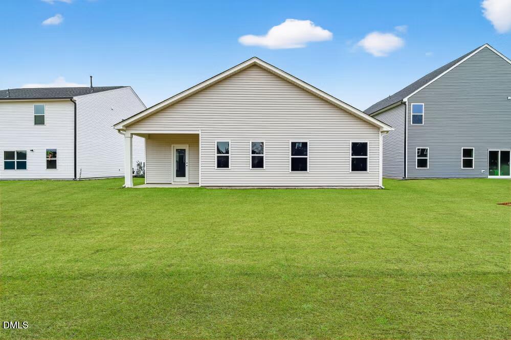 460 Hallingsfield Way Zebulon, NC 27597 - Photo 5 of 31 a view of a house with backyard