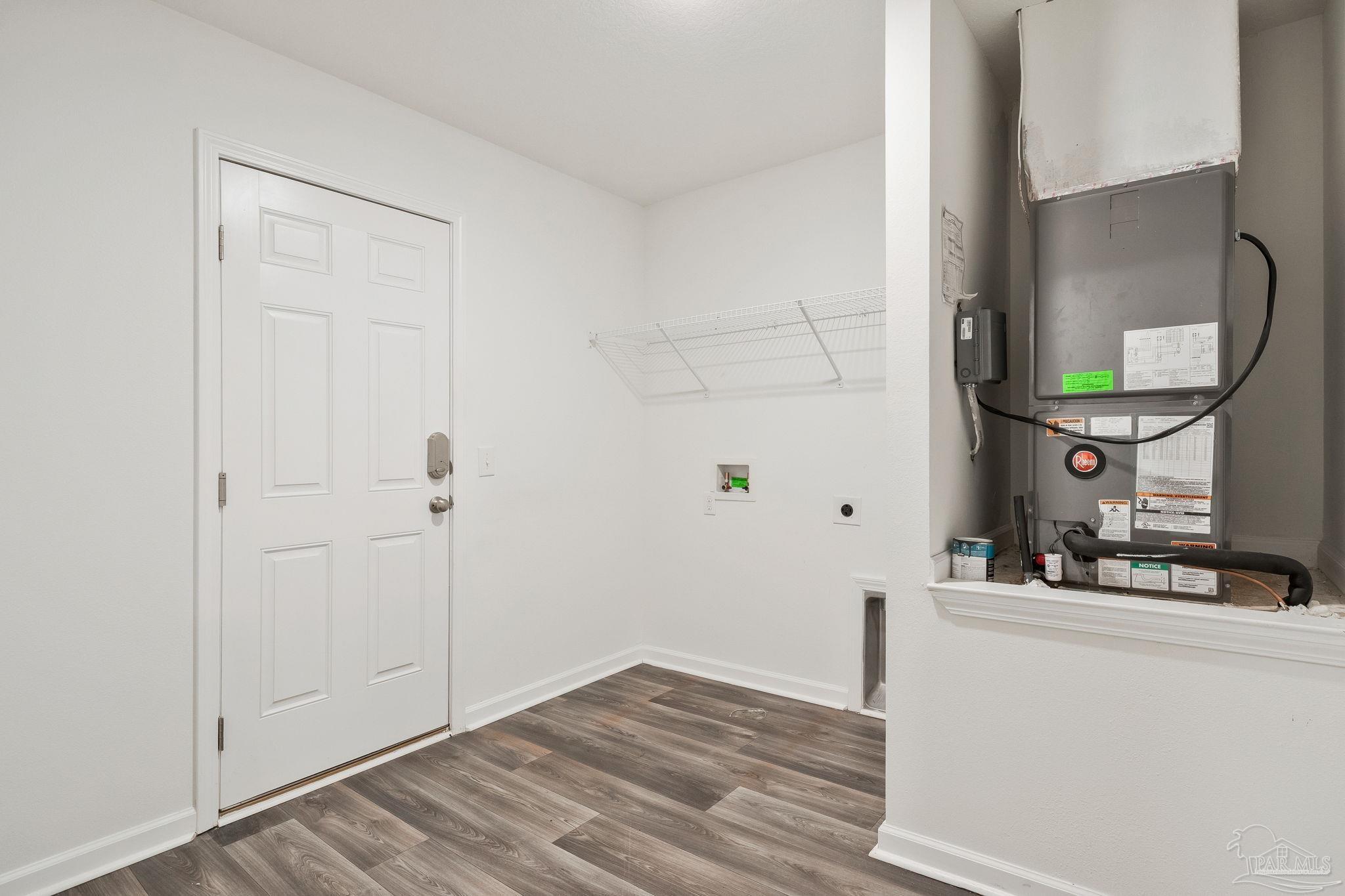 1625 Addies Way Pensacola, FL 32534 - Photo 14 of 50 a view of a hallway to a room and wooden floor