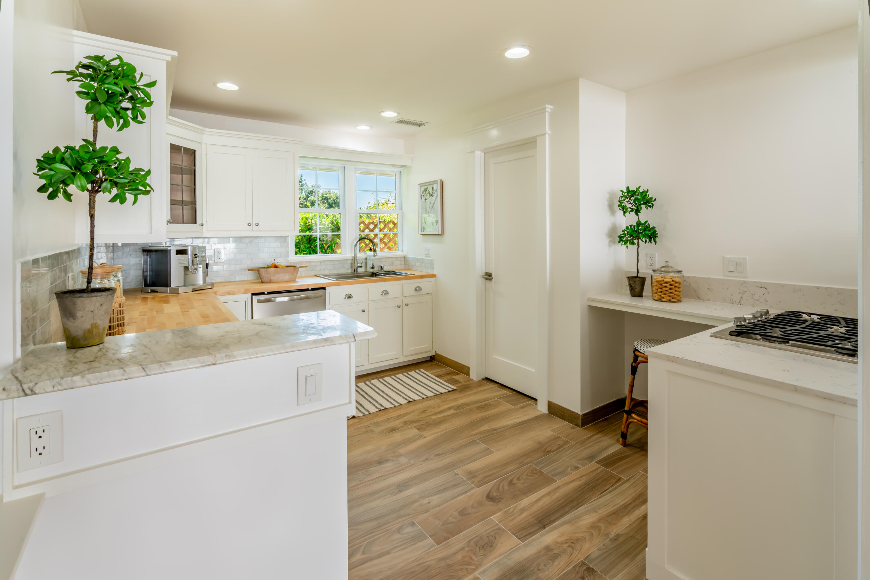 1180 High Road Montecito, CA 93108 - Photo 28 of 39 a kitchen with a sink and stove