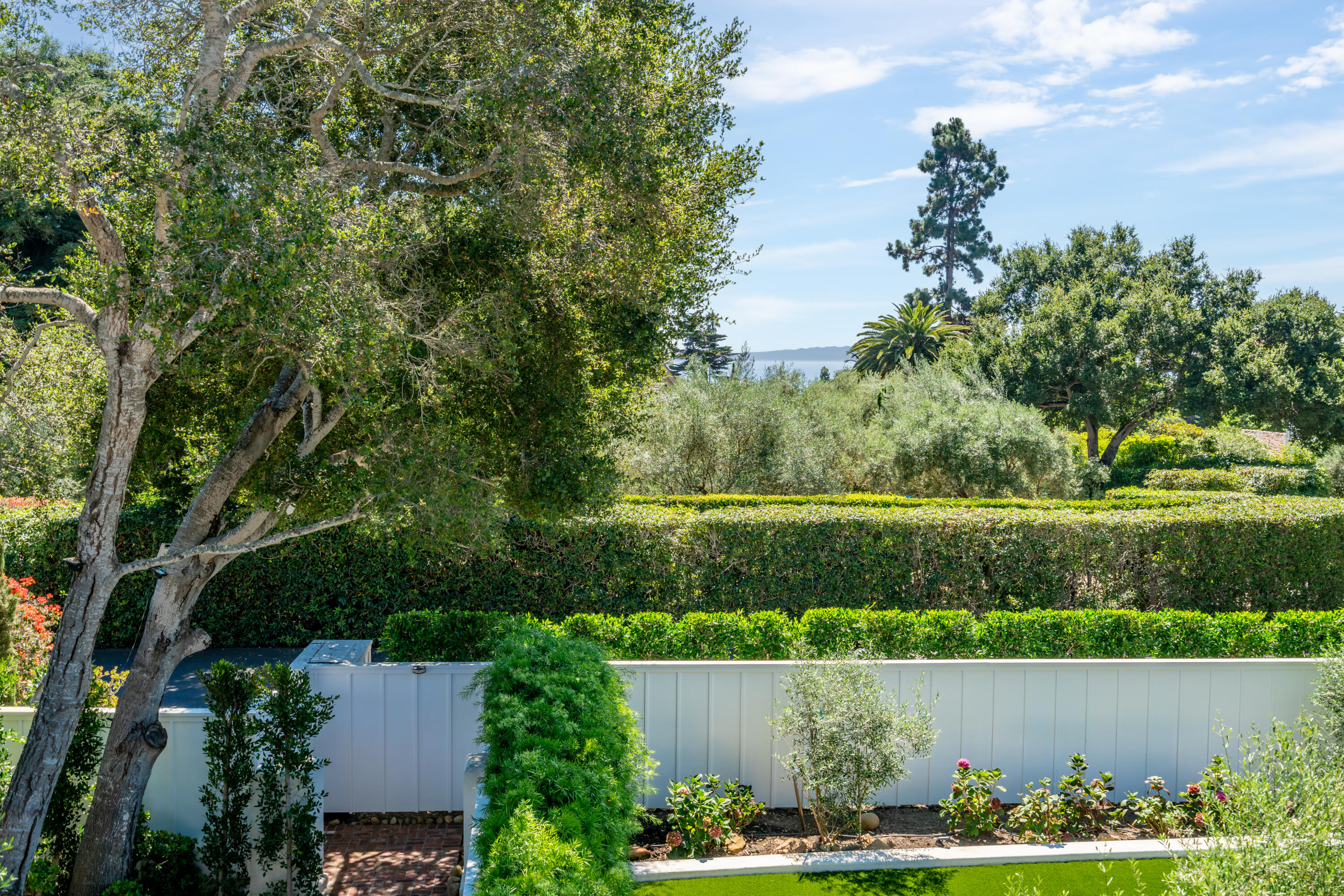 1180 High Road Montecito, CA 93108 - Photo 36 of 39 an aerial view of a house with a yard