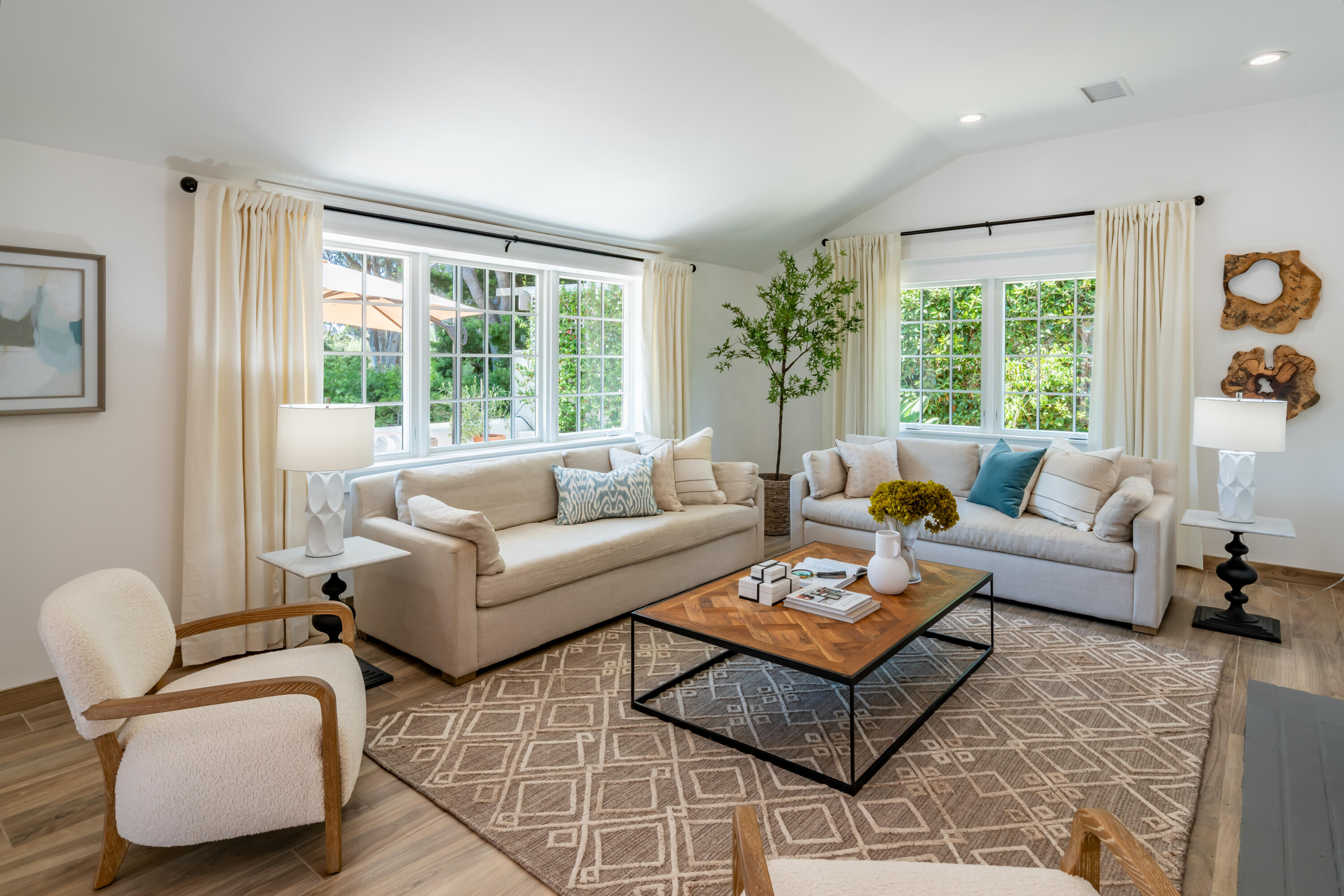 1180 High Road Montecito, CA 93108 - Photo 6 of 39 a living room with furniture and a large window