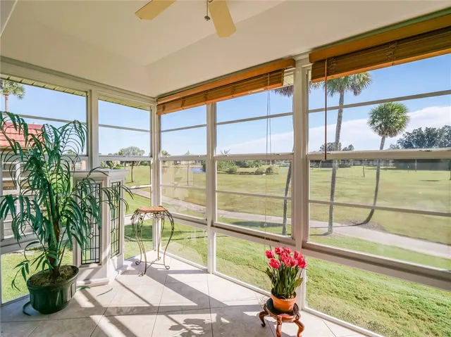 a view of a porch with a potted plant
