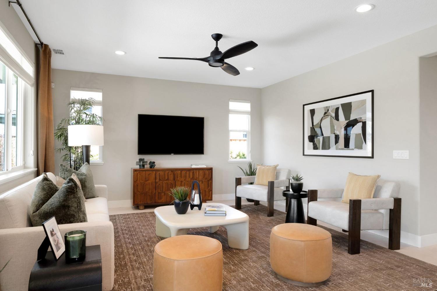 736 Temescal Street Antioch, CA 94561 - Photo 13 of 39 a living room with furniture and a flat screen tv