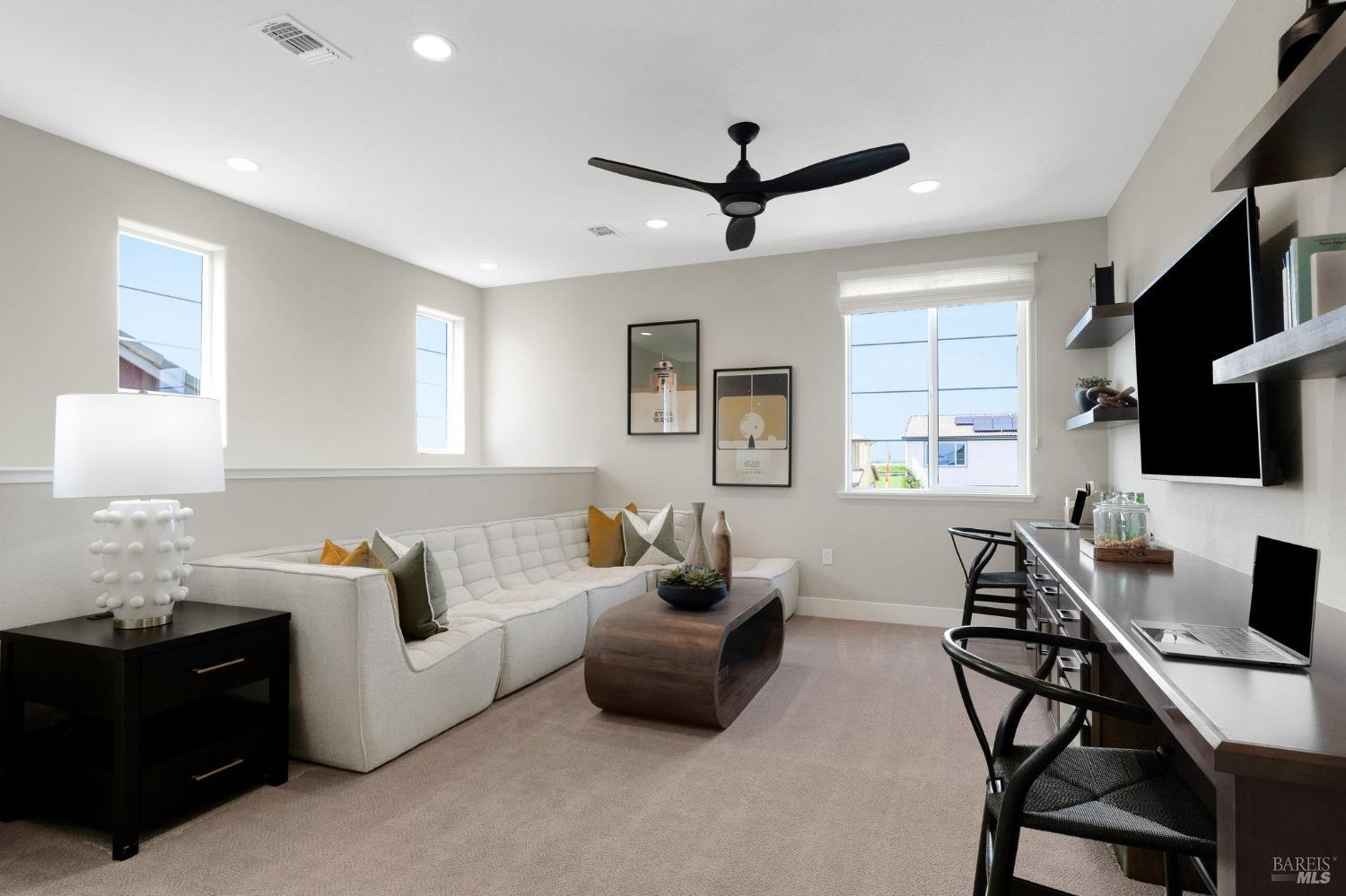 736 Temescal Street Antioch, CA 94561 - Photo 18 of 39 a living room with furniture and a flat screen tv