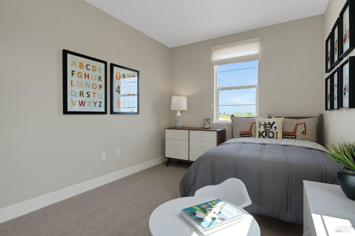 736 Temescal Street Antioch, CA 94561 - Photo 34 of 39 a bedroom with a bed and a couch