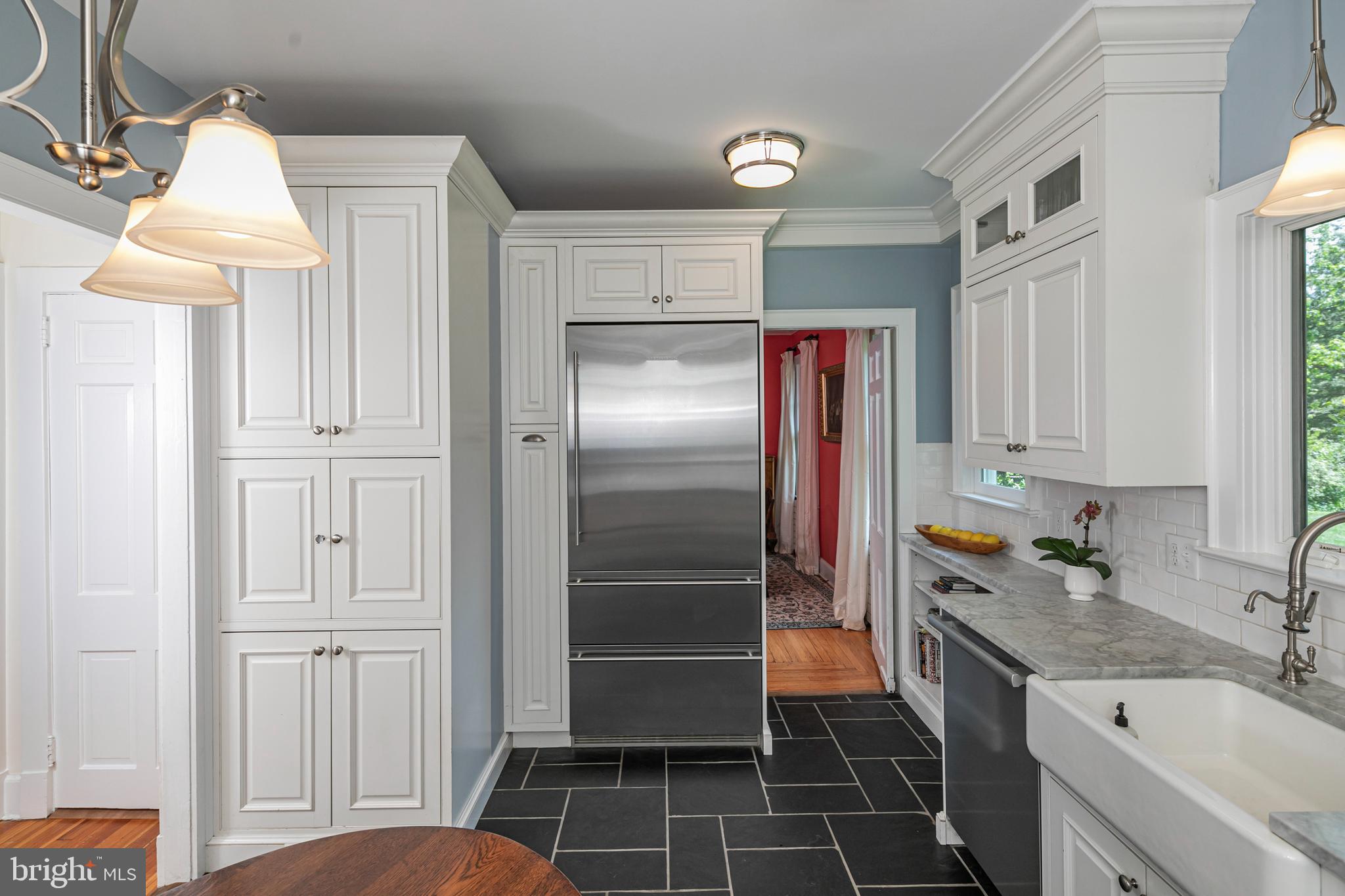 8 Ober Road Princeton, NJ 08540 - Photo 11 of 34 a kitchen with a refrigerator and a sink