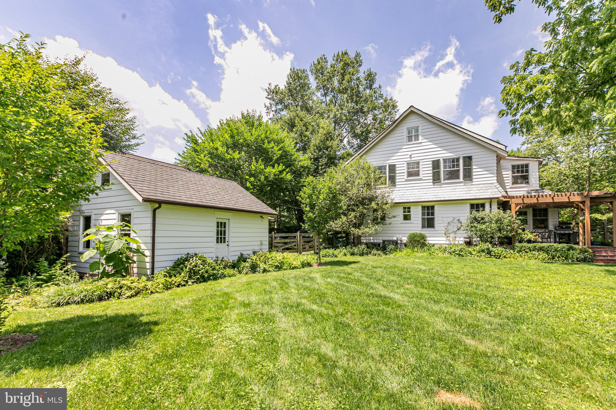 8 Ober Road Princeton, NJ 08540 - Photo 29 of 34 a front view of a house with a yard and trees
