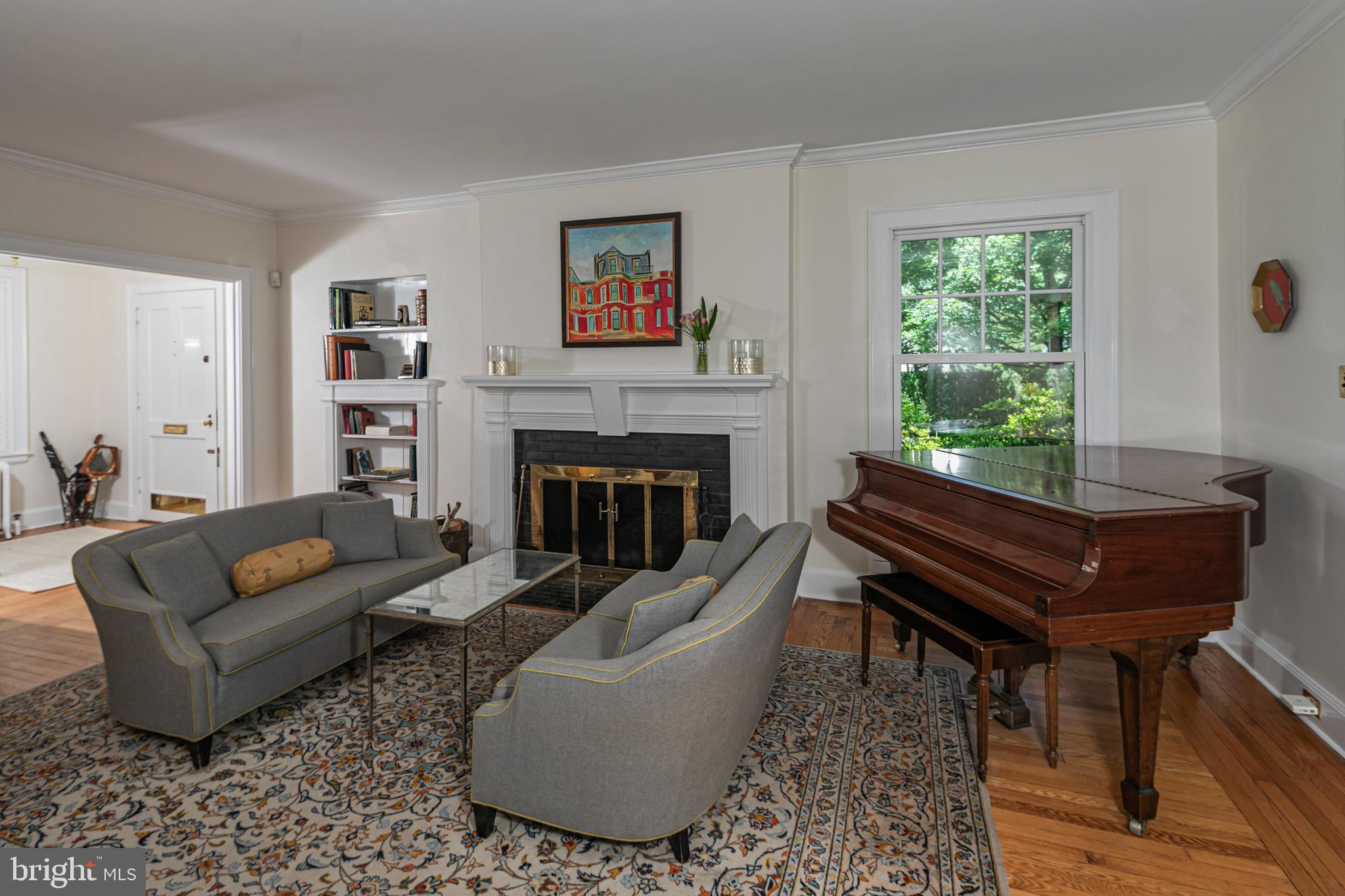 8 Ober Road Princeton, NJ 08540 - Photo 5 of 34 a living room with furniture a large window and a fireplace