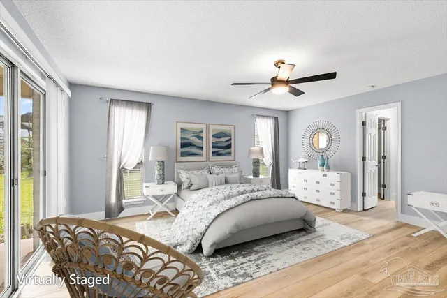 an empty room with closet and windows