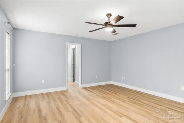 a bathroom with a bathtub and a sink