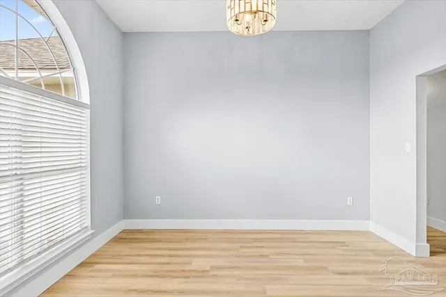 a view of an empty room and window