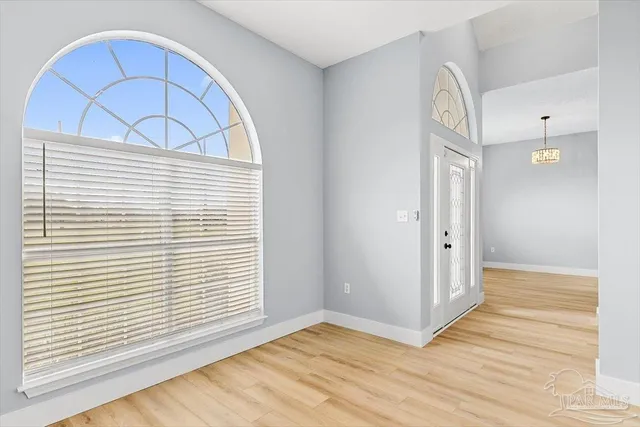 a view of a livingroom with wooden floor