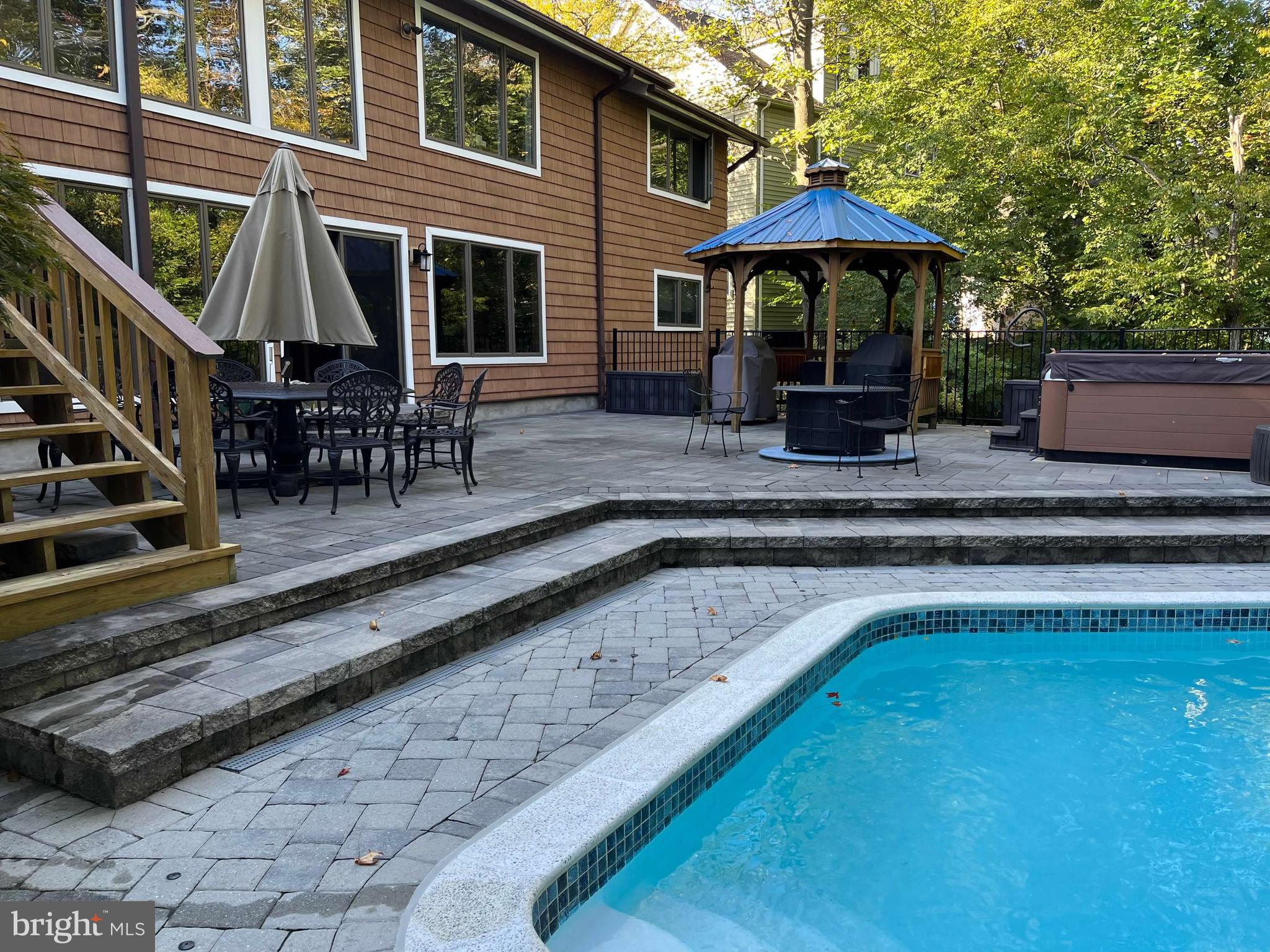 3530 Cedar Drive Edgewater, MD 21037 - Photo 2 of 7 a view of a house with pool and chairs