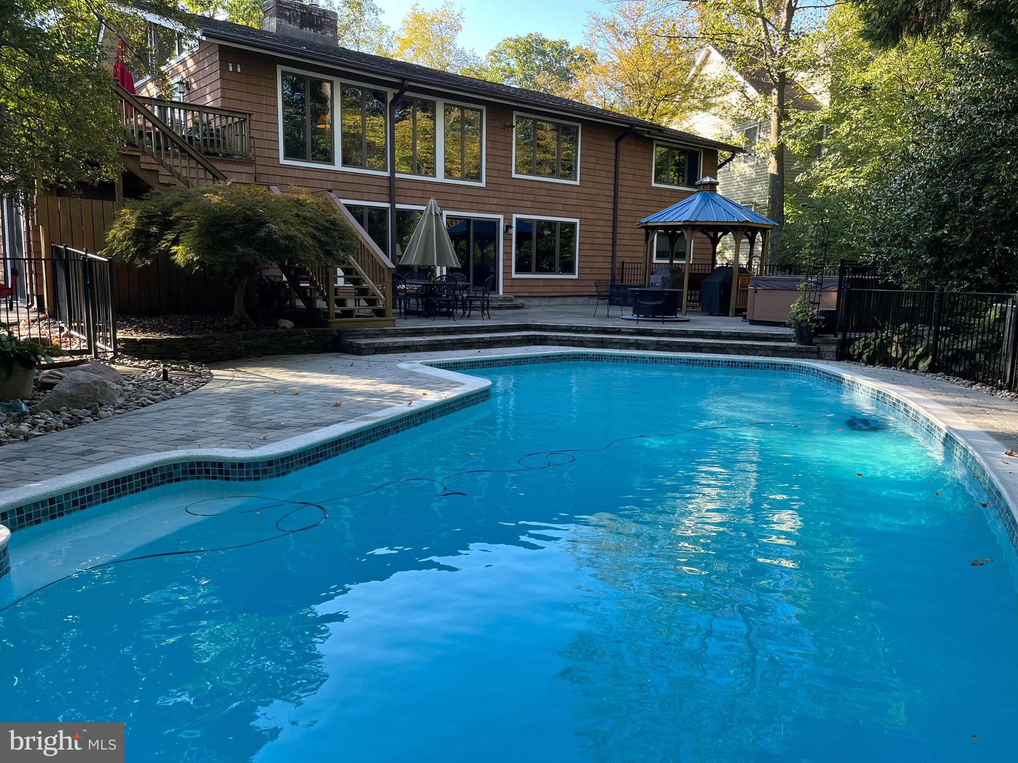 3530 Cedar Drive Edgewater, MD 21037 - Photo 3 of 7 a front view of a house with garden
