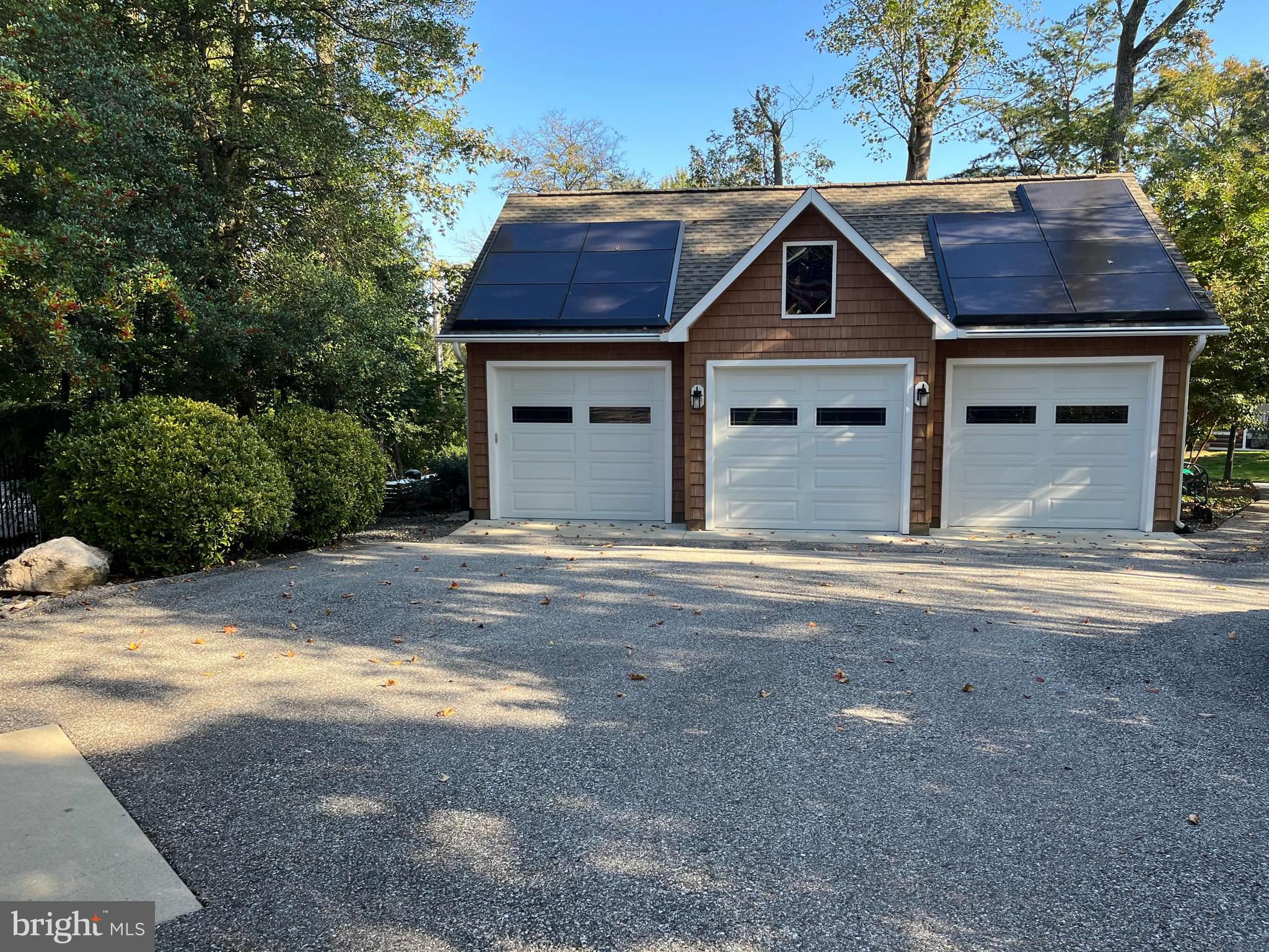 3530 Cedar Drive Edgewater, MD 21037 - Photo 6 of 7 a view of a house with a yard and large tree