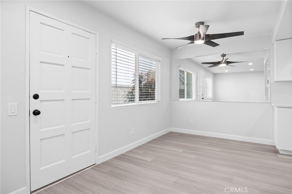 114 10th Street, Unit B Huntington Beach, CA 92648 - Photo 8 of 11 a view of a livingroom with a ceiling fan