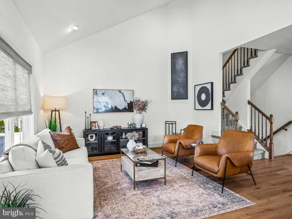 a living room with furniture and a couch