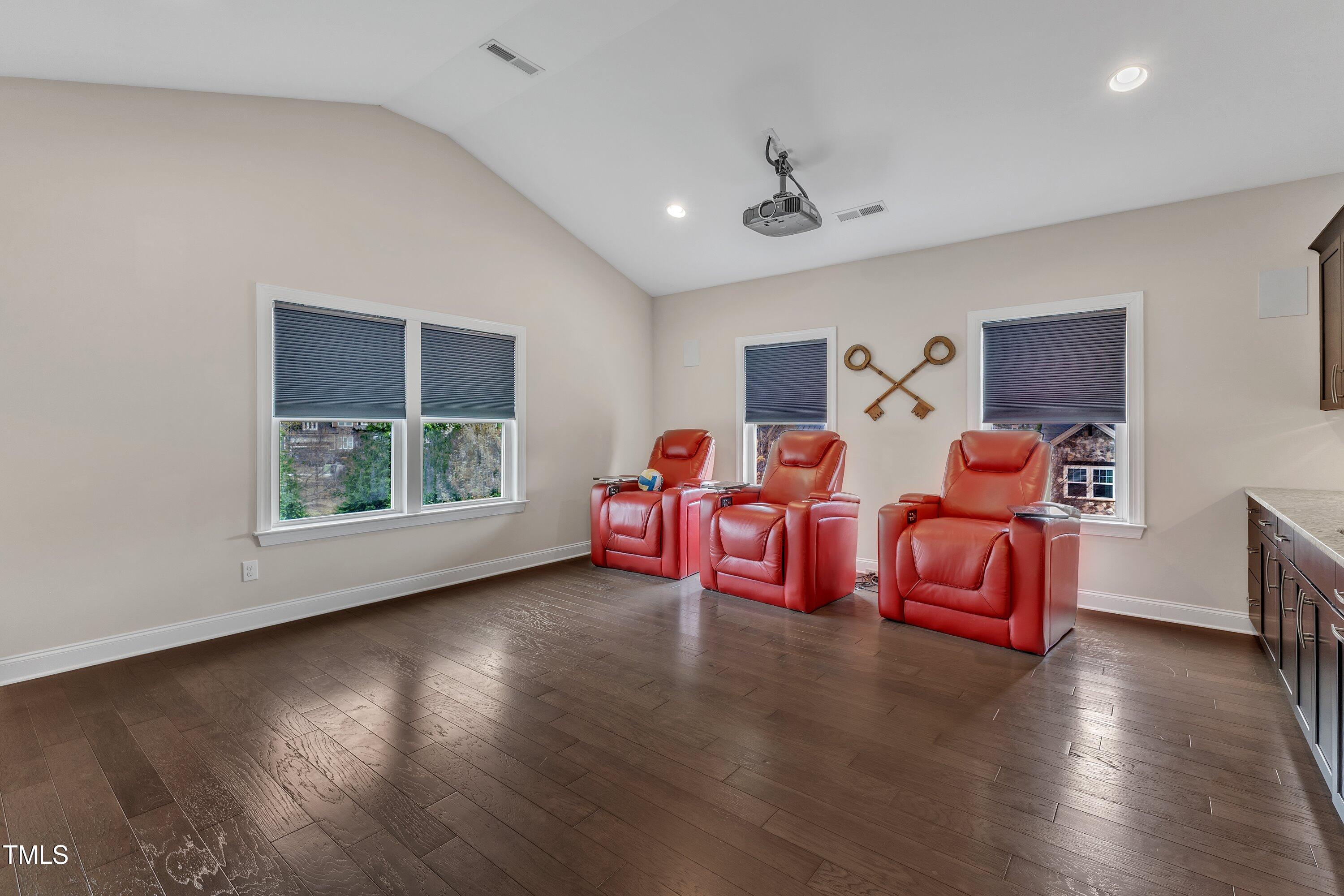 8121 Greys Landing Way Raleigh, NC 27615 - Photo 40 of 95 a bedroom with furniture and a large window