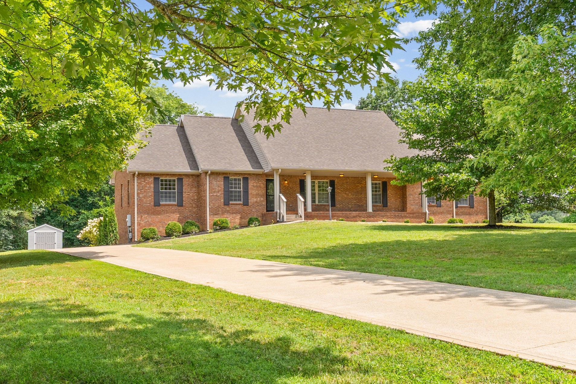 748 Gholson Road Clarksville, TN 37043 - Photo 1 of 87 a aerial view of a house with a yard and large trees