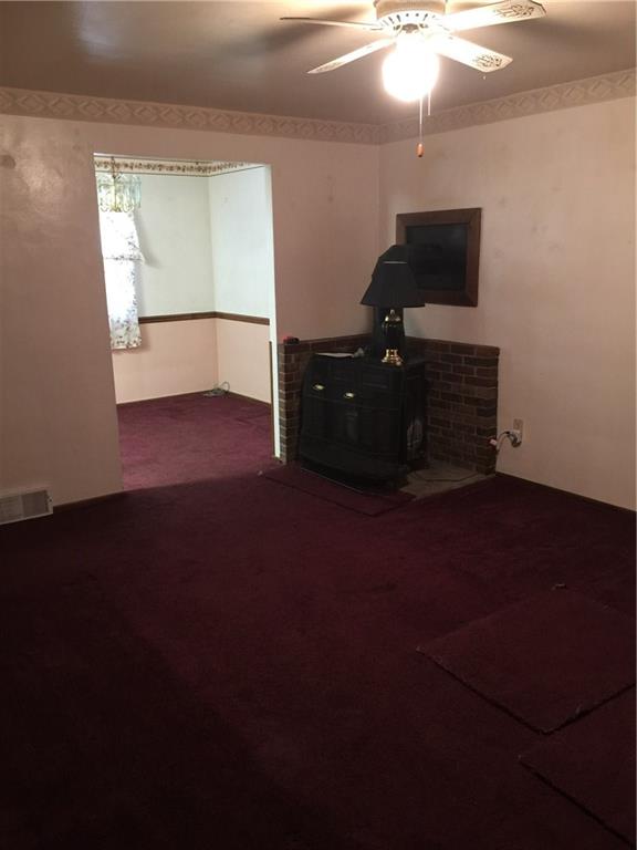 715 Center Road Plum, PA 15239 - Photo 2 of 15 Living room with working wood burner
