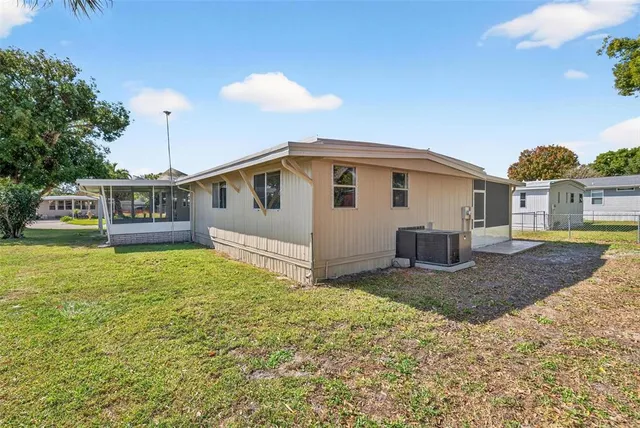 a view of a kitchen from the hallway