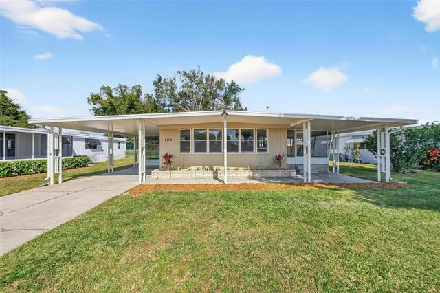 an aerial view of ocean residential houses with outdoor space
