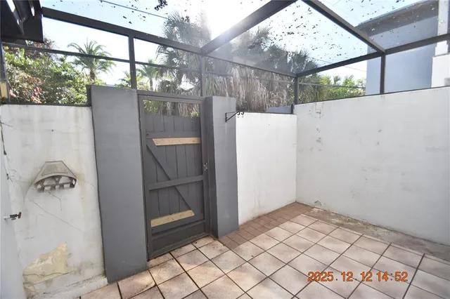 a bathroom with a shower and a mirror