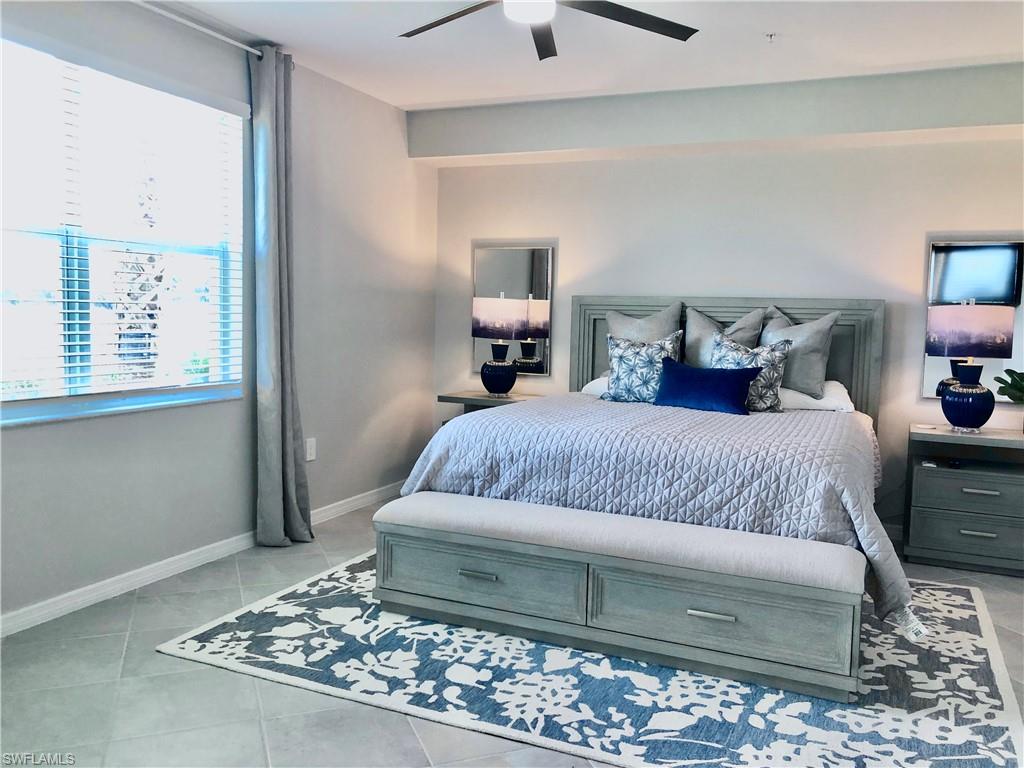 43253 Water Bird Way, Unit 5811 Babcock Ranch, FL 33982 - Photo 11 of 21 a bedroom with a bed and window