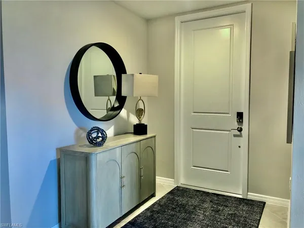 a view of storage and utility room with washer and dryer