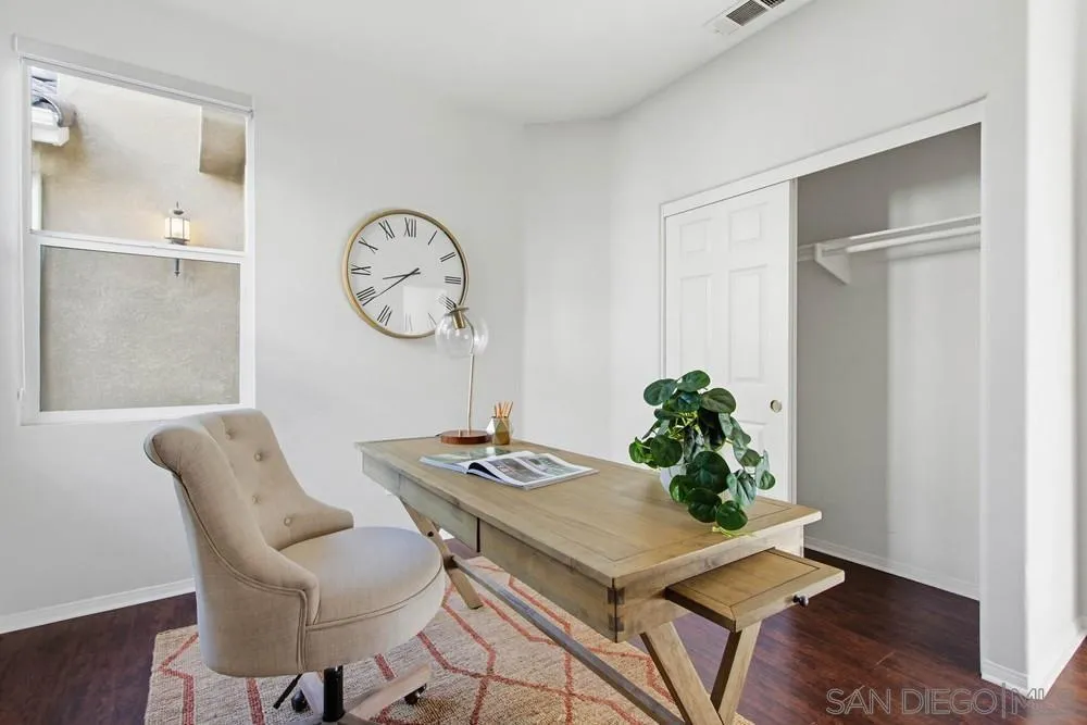 5423 Foxtail Loop Carlsbad, CA 92010 - Photo 24 of 67 a workspace with furniture and wooden floor