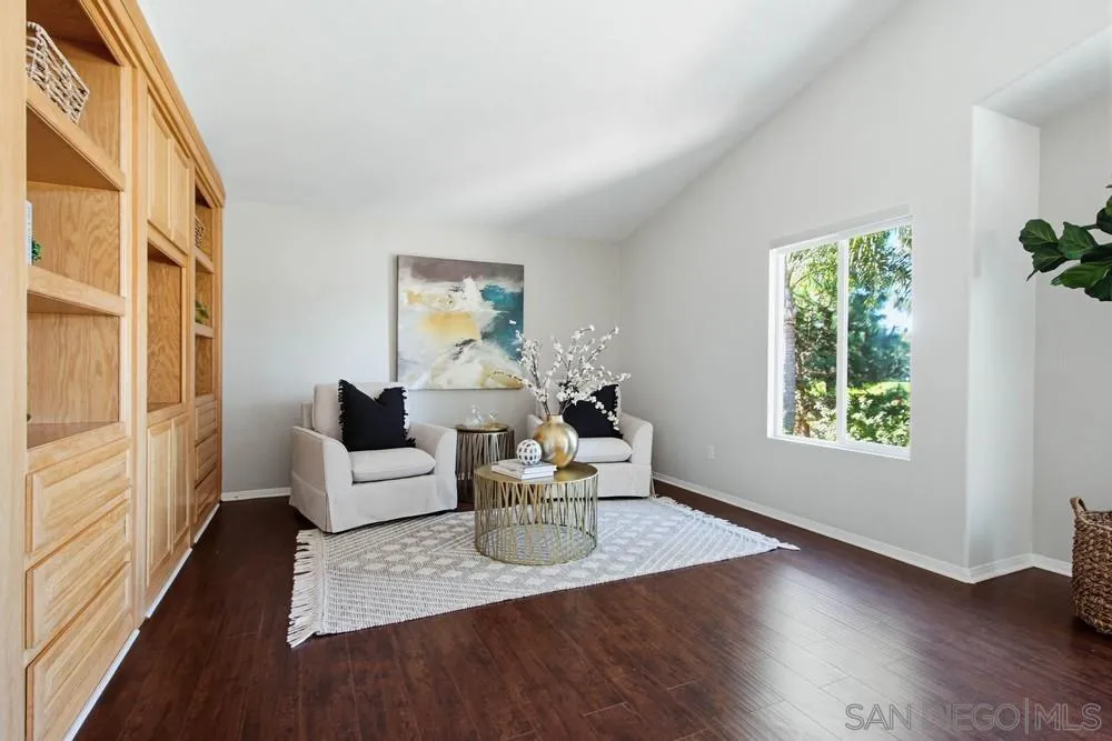 5423 Foxtail Loop Carlsbad, CA 92010 - Photo 30 of 67 a living room with furniture and a window