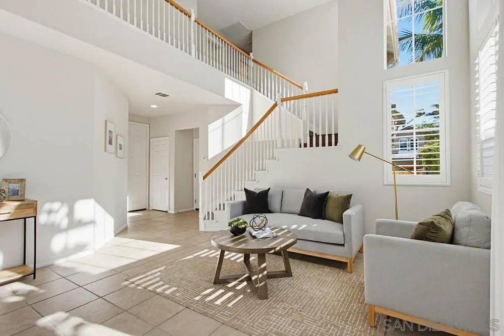 5423 Foxtail Loop Carlsbad, CA 92010 - Photo 3 of 67 a living room with furniture and a potted plant