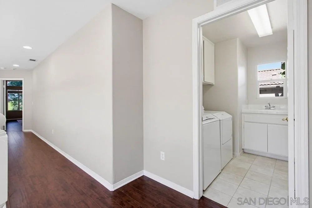 5423 Foxtail Loop Carlsbad, CA 92010 - Photo 40 of 67 a view of hallway with washer and dryer