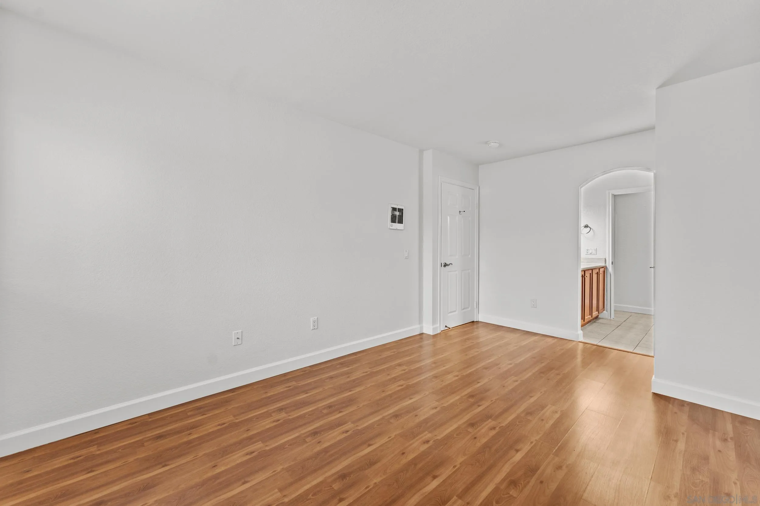 12745 Robison Boulevard Poway, CA 92064 - Photo 12 of 14 a view of an empty room with wooden floor