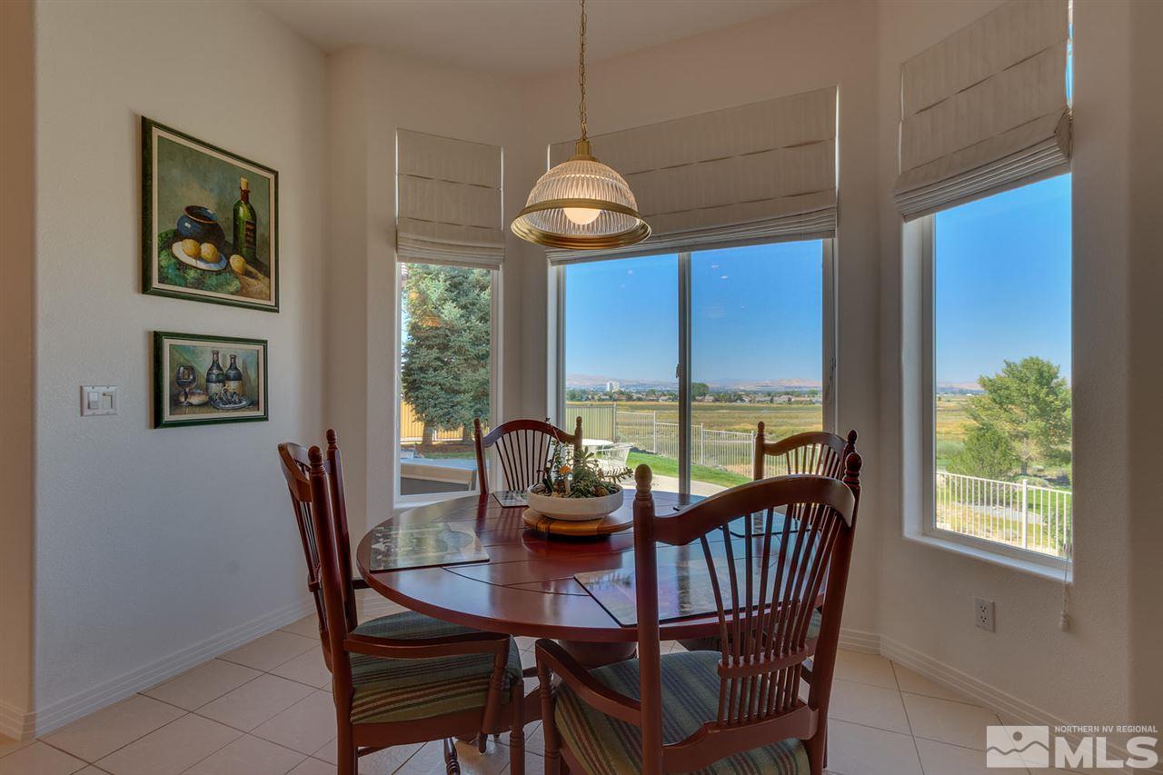 5419 Greenview Court Reno, NV 89502 - Photo 12 of 25 a view of a dining room with furniture window and outside view