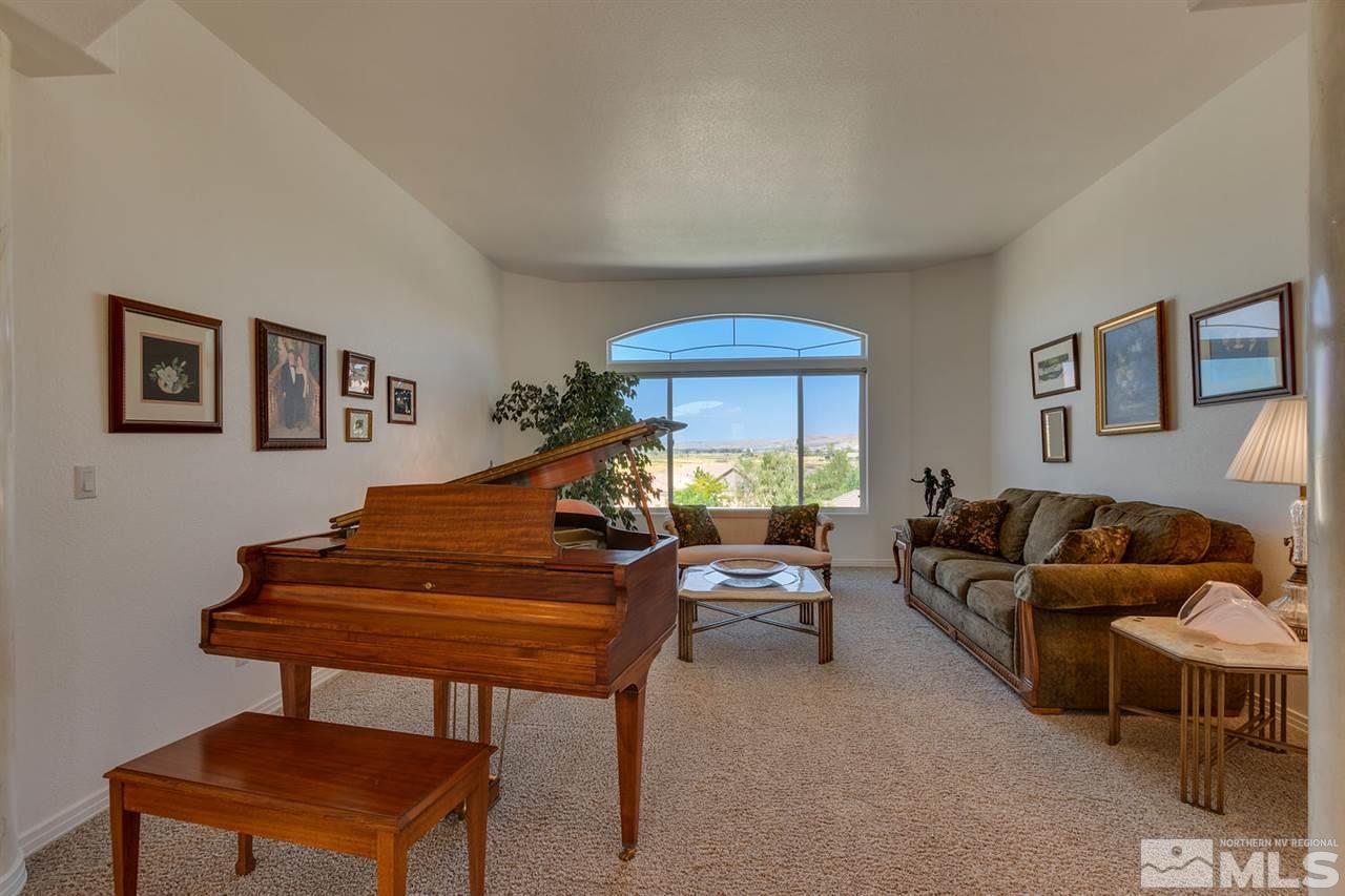 5419 Greenview Court Reno, NV 89502 - Photo 5 of 25 a living room with furniture and a piano