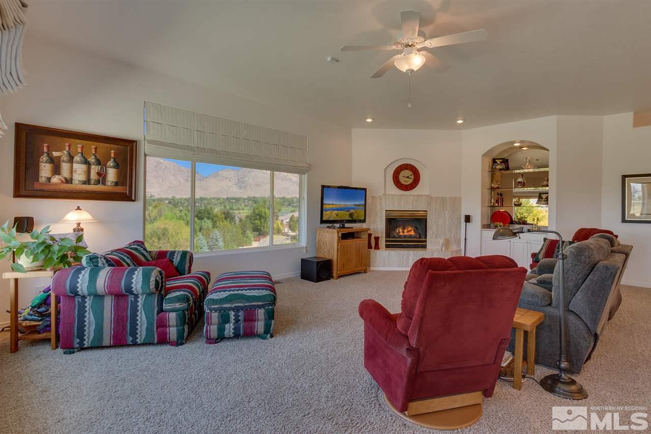 5419 Greenview Court Reno, NV 89502 - Photo 8 of 25 a living room with furniture and a large window